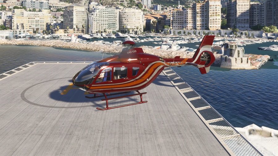 Eurocopter EC-135 posé sur une plateforme au bord du port de Monaco, sur le simulateur de vol hélicoptère HélicoSimu