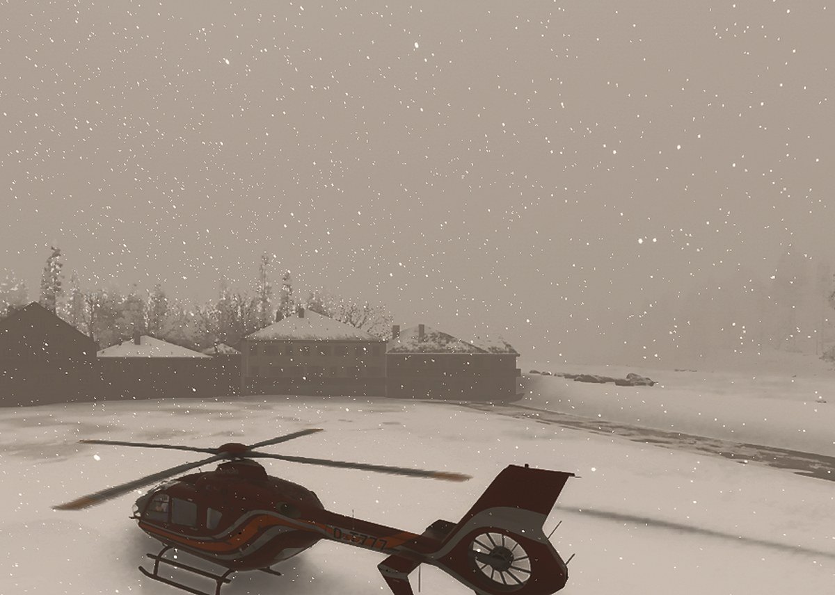 Hélicoptère posé au sol pendant une chute de neige, sur le simulateur de vol hélicoptère HélicoSimu